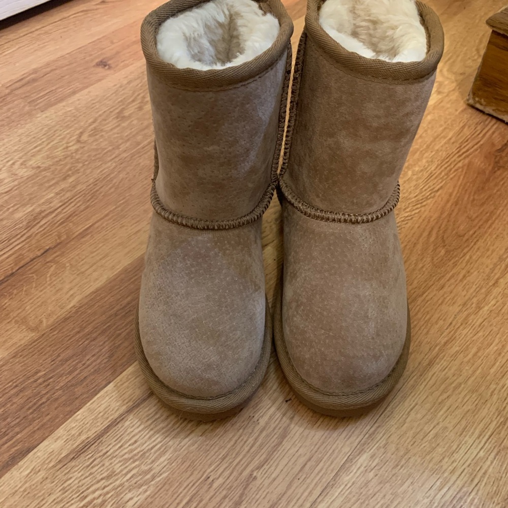 Brand New without box Lamo boots